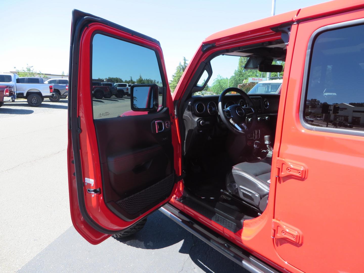 2020 Red /black Jeep Gladiator Rubicon (1C6JJTBG6LL) with an 3.6L V6 DOHC 24V engine, 6M transmission, located at 2630 Grass Valley Highway, Auburn, CA, 95603, (530) 508-5100, 38.937893, -121.095482 - Rubicon Gladiator featuring a Mopar suspension system with Fox shocks, 17" AEV wheels wrapped in 37" BFG tires, Warn Winch, Rock sliders, Cascade front license plate holder, Impact bedliner, Built Right Industries bed Molle panels, and Window tint. - Photo#16